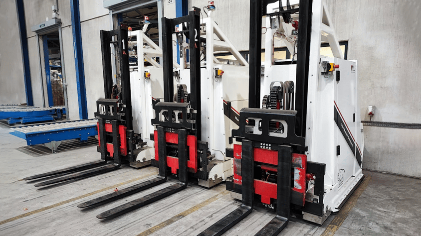 Rhino Automated Guided Forklifts at a charging station