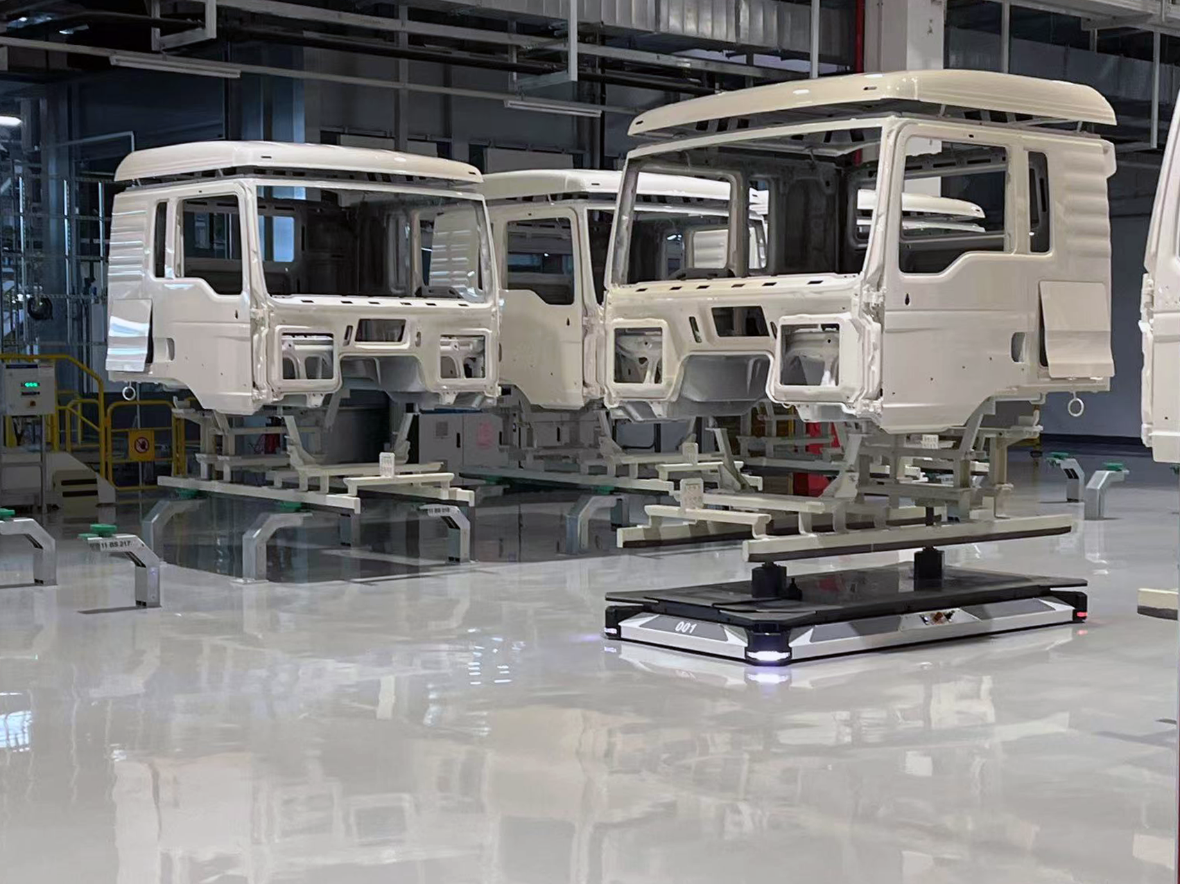 Paint shop AGV robot at work in a factory